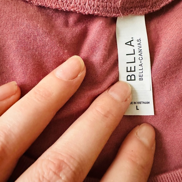 Women’s Large tank top, deep pinkish hue, small pull on bottom left as pictured. - Picture 2 of 2